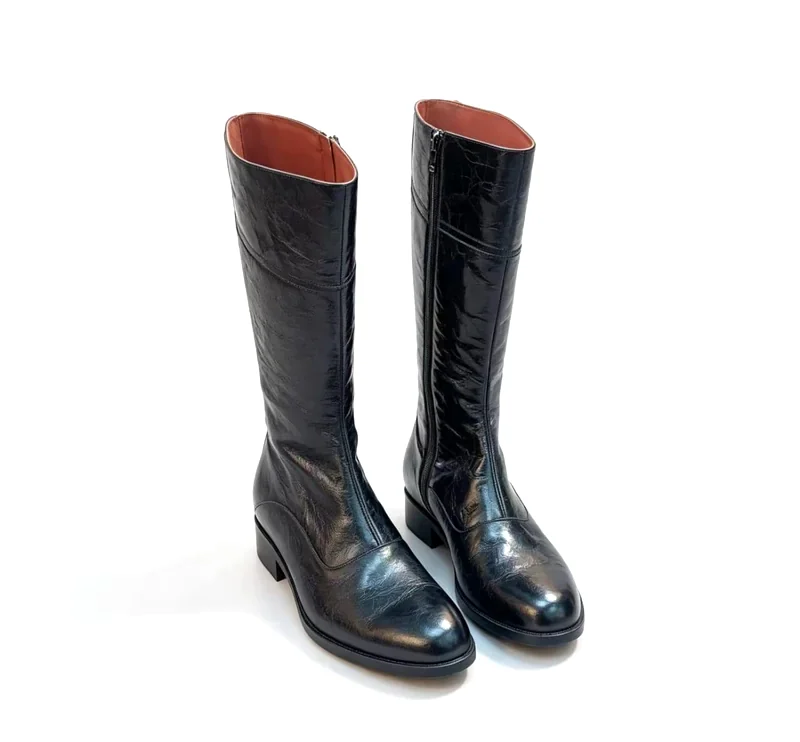DeNjock High Knee Boot pair, three-quarter view