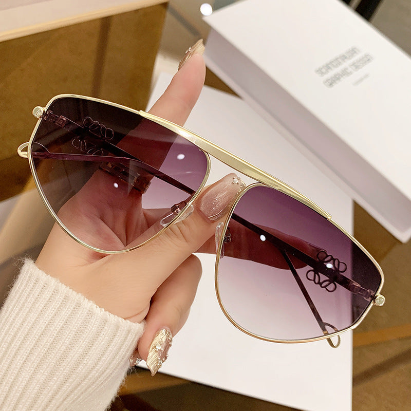 Single beam irregular sunglasses, metal toad hollow sunglasses, European and American UV resistant sunglasses, concave design for women