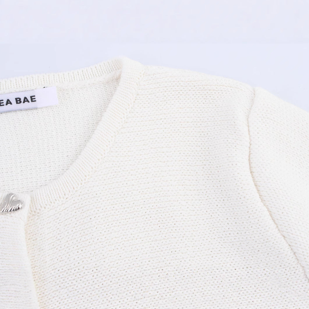 Short skirt style hem long sleeved knitted sweater jacket for women
