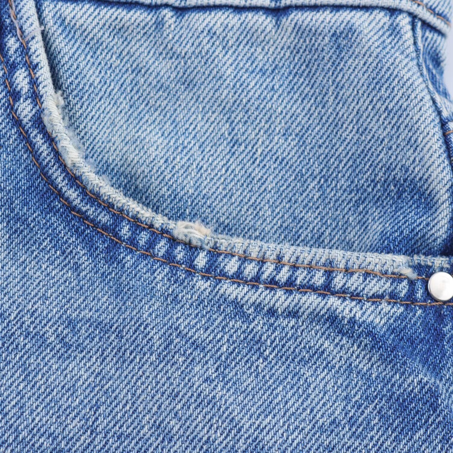 Making vintage accessories including hip hugging denim skirt for women
