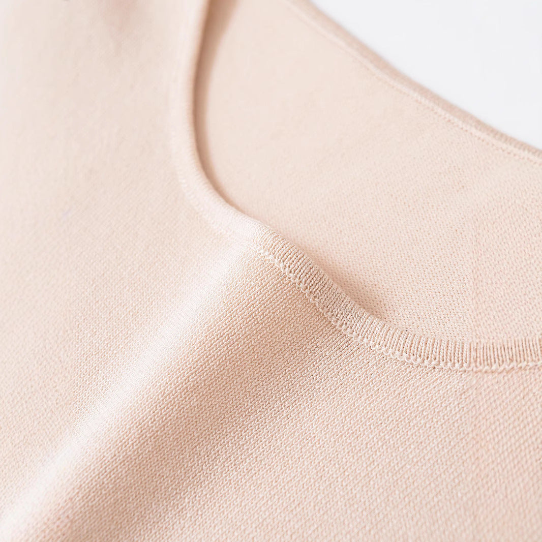 Round neck short sleeved asymmetrical hem knitted T-shirt top for women