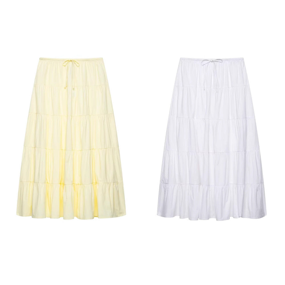 Solid color waist tie with layered patchwork half length skirt